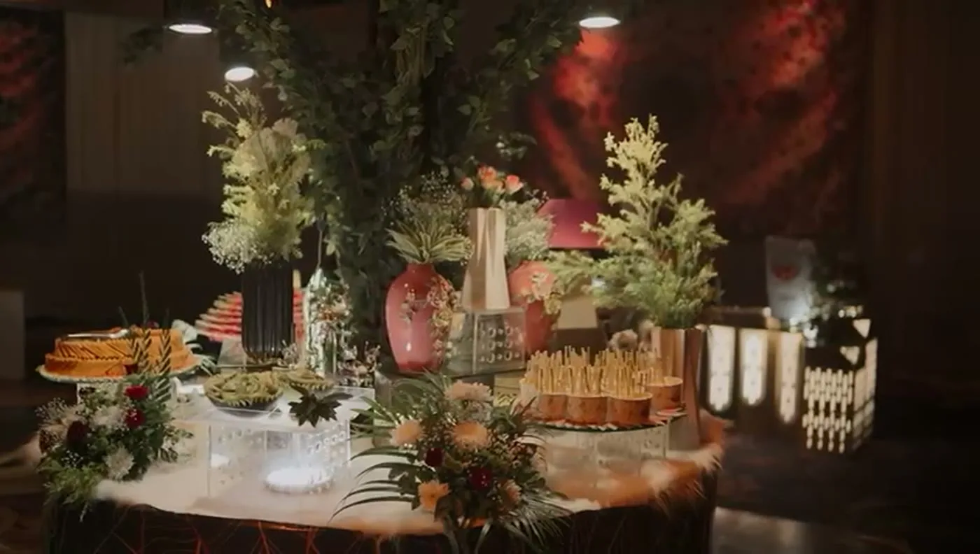 Flowers and candlelit decor at the venue entrance